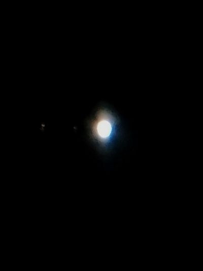 Jupiter and its moons (Io, Europa, Callisto).