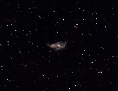 Слияние галактик NGC 2207 и IC 2163 в созвездии Б. Пса