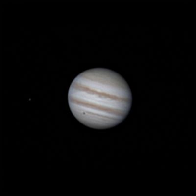 Юпитер, спутник Европа и тень от Европы на поверхности Юпитера