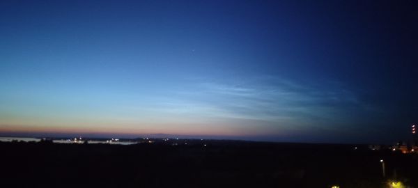 Noctilucent clouds before sunset - Astrophotography