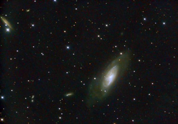 Galaxy M106 in the constellation Canes Venatici and other, smaller galaxies. - Astrophotography